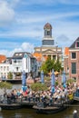 Church tower and cafe on Rhine canal, Leiden, Netherlands