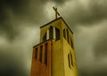 Church tower in the cloudy sky