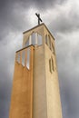 Church tower in the cloudy sky