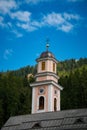 a church tower with a cross on the top and a sky background Royalty Free Stock Photo