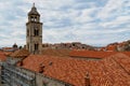 Church Tower and rooftop against blue sky in Dubrovnik Royalty Free Stock Photo