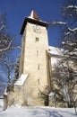 Church tower in winter transylvanian village Royalty Free Stock Photo