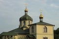 Church with two yellow domes with crosses