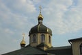 Church with two yellow domes with crosses