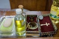 Church utensils at the altar, glans,ceremony of water baptism, various objects needed for baptism christening - oil, soap, scissor Royalty Free Stock Photo