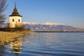 Church of Virgin Mary in Havranok and lake Liptovska Mara, district Liptovsky Mikulas, Slovakia Royalty Free Stock Photo