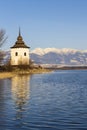 Church of Virgin Mary in Havranok and lake Liptovska Mara, district Liptovsky Mikulas, Slovakia Royalty Free Stock Photo