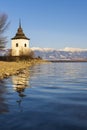 Church of Virgin Mary in Havranok and lake Liptovska Mara, district Liptovsky Mikulas, Slovakia Royalty Free Stock Photo