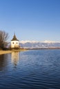 Church of Virgin Mary in Havranok and lake Liptovska Mara, district Liptovsky Mikulas, Slovakia Royalty Free Stock Photo