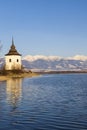 Church of Virgin Mary in Havranok and lake Liptovska Mara, district Liptovsky Mikulas, Slovakia Royalty Free Stock Photo