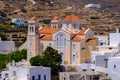 Church, whitewashed houses and arid landscape on Tinos Island