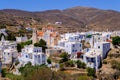 Church, whitewashed houses and arid landscape on Tinos Island