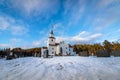 Church in winter with snow and blue sky in Iveland Norway Royalty Free Stock Photo