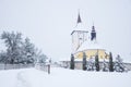 Church in winter - snowy nature in Christmas time. Beautiful photo in village