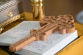 Church wooden cross on the Bible