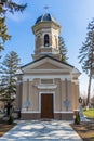 a church with a wooden door and tower in a park Royalty Free Stock Photo