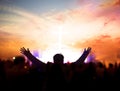 Church worship concept:Christians raising their hands in praise and worship at a night music concert Royalty Free Stock Photo
