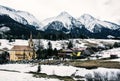 Church in Zdiar village with Belianske Tatry mountains, blue filter