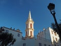 Churche tower in Calvi, Corse, France in golden light with lamp