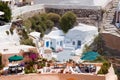 Churches with blue domes on the edge of the caldera on the island of Santorini, Greece. Royalty Free Stock Photo