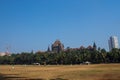 Churchgate, Mumbai, Maharashtra in a clear, sunny day; lawn with cricket players