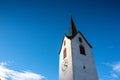 a churchtower with blue sky