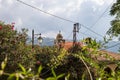 Churchtower, powerlines and bushes in Deir el Qamar, Lebanon