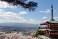 Chureito pagoda and cherry blossom as foreground and mount fuji as background, destination in japan Royalty Free Stock Photo