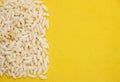 Churmure or murmure or moori, Puffed rice, food ingredient. Traditional food isolated on yellow background Royalty Free Stock Photo