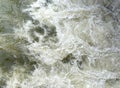 Churning water flows with high front dam Royalty Free Stock Photo