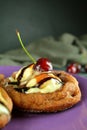 Churro Bowls with Vanilla Ice Cream, Salted Caramel Sauce and Cherries Royalty Free Stock Photo