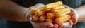 Churro Sticks in Hand, Churros Pastry, Fried Spanish Dessert, Churro Sticks Closeup, Copy Space