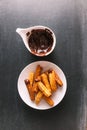 Churros and chocolate sauce Royalty Free Stock Photo