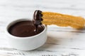 Churros with chocolate, a traditional Spanish sweet food pastry dessert. Royalty Free Stock Photo