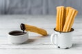 Churros with chocolate, a traditional Spanish sweet food pastry dessert. Royalty Free Stock Photo