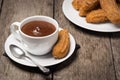 Churros with Chocolate on Wooden Table Royalty Free Stock Photo