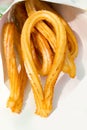 Churros fried crullers spanish flour fritters Royalty Free Stock Photo