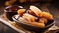 Churros and hot chocolate on the table. Traditional spanish dessert, street food