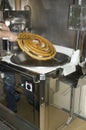 Churros preparation. Draining the wheel