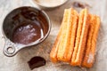 Churros with sugar and chocolate sauce Royalty Free Stock Photo