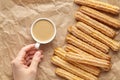 Churros traditional homemade Spain breakfast or lunch meal street fast food baked sweet dough snack dessert with coffee Royalty Free Stock Photo