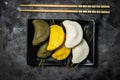 Chuseon day concept, korean thanksgiving day - songpyeon rice cakes on rustic background