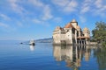 The ChÃÂ¢teau de Chillon and tourist motor ship Royalty Free Stock Photo