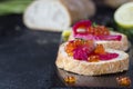 Ciabatta with beet Gravlax salmon with caviar Royalty Free Stock Photo