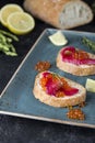 Ciabatta with beet Gravlax salmon with caviar Royalty Free Stock Photo