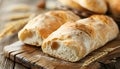 ciabatta with ears on the wooed table Royalty Free Stock Photo