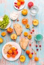 Ciabatta with peach and apricot jam, ricotta cheese, fruits and smoothie Royalty Free Stock Photo