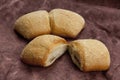 Ciabatta rolls on dessert stand, vertical photo. Royalty Free Stock Photo