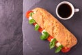 Ciabatta sandwich with caprese salad with coffee. Royalty Free Stock Photo