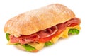 Ciabatta sandwich with lettuce, tomatoes prosciutto and cheese isolated on white background Royalty Free Stock Photo